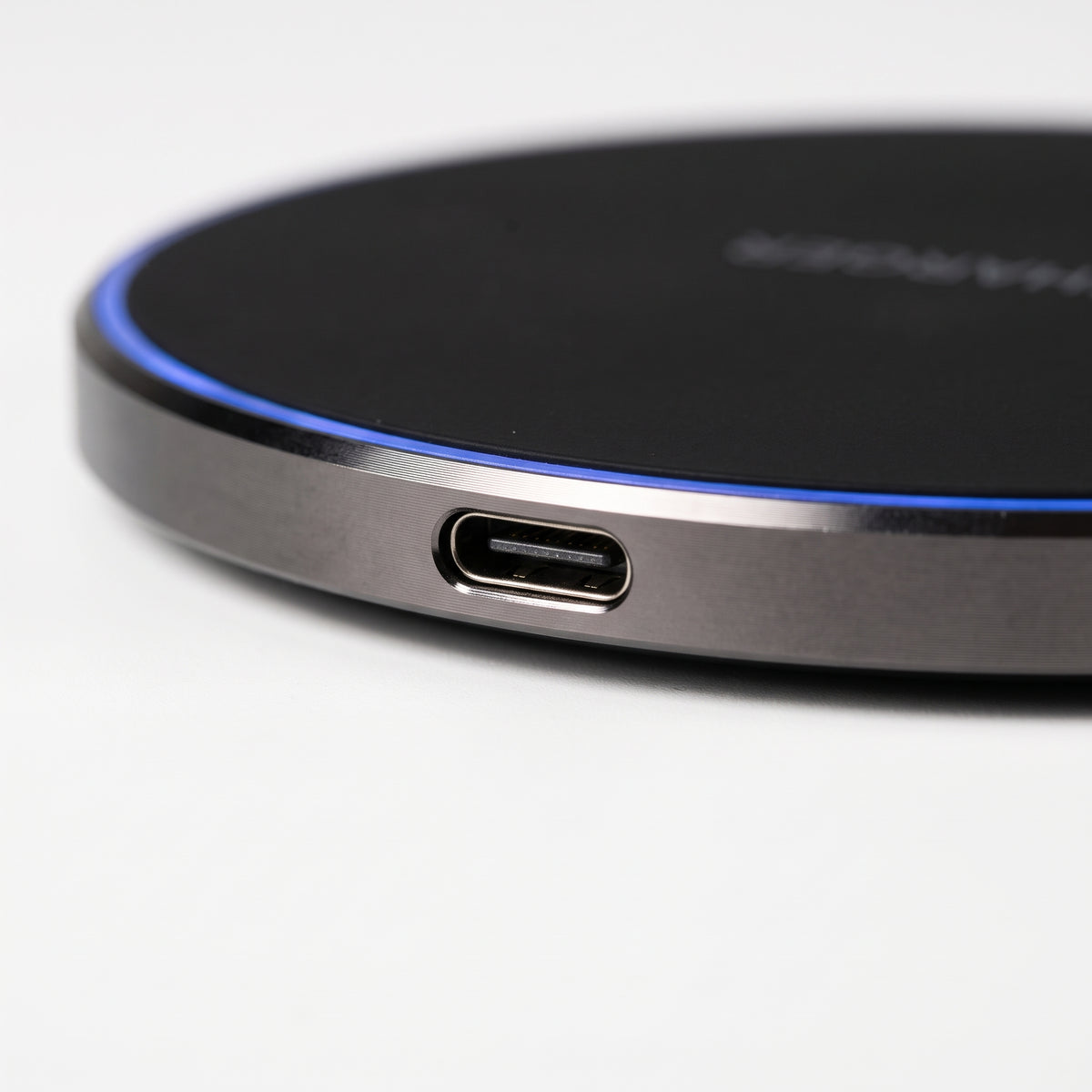 Wireless Charging Pad — USB-C & Rim Detail Macro | Generated by Modelize